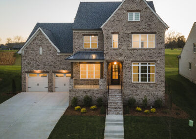 outside of barlow home in avenue downs at dusk